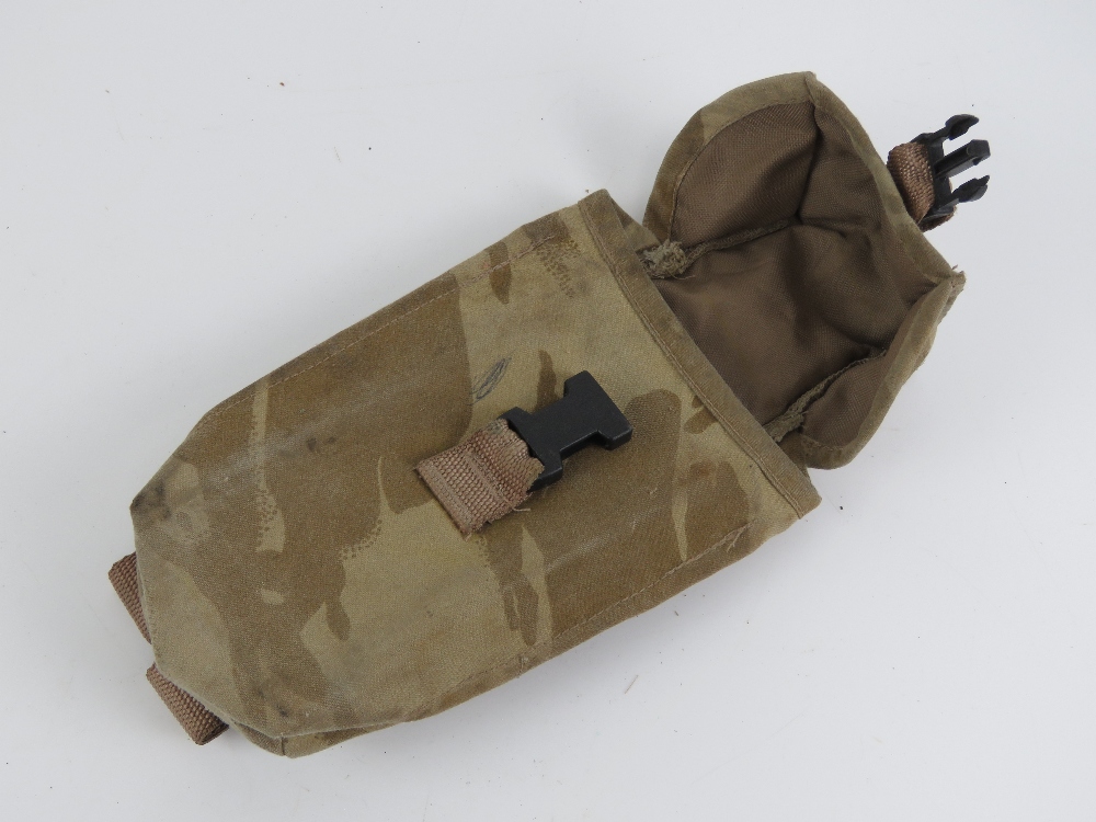 A desert camouflage magazine pocket.