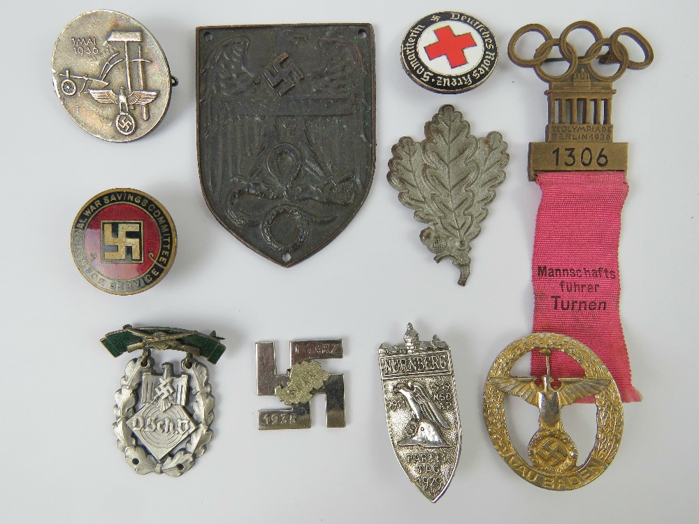 A quantity of assorted WWII German day badges including; 1944 Warschau, 1936 XI.