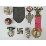 A quantity of assorted WWII German day badges including; 1944 Warschau, 1936 XI.