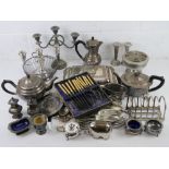 A quantity of silver plated items including; lidded tureen, candelabras, toast rack, coffee pot,