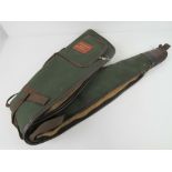 A fleece-lined canvas gun slip by Four Counties Sports Newbury, zip a/f.