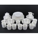 A quantity of Royal Doulton 'Regency White' tea and dinnerware comprising dinner plates,