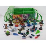 A quantity of assorted Skylander models by Activision contained within Skylander carry case.