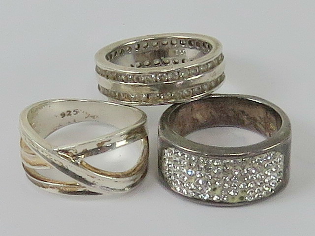 Three silver rings sizes M-N, each stamped 925.