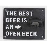 A contemporary cast metal 'the best beer is an open beer' sign, 17 x 12.5cm.