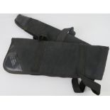 A fleece-lined canvas gun slip by Southern Counties Shooting Ltd, zip a/f.