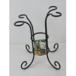 A wine bottle and glass caddy, as new with label, by Panacea, for the garden table.