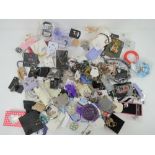 A quantity of assorted fashion jewellery, some in original packaging.
