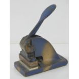A late 19th early 20th century spring loaded cast iron letter stamp with plate for Crowell End,