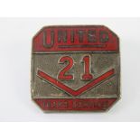 A HM silver United Automobile Services badge having red enamel for '21 Years SErvice' No 953,