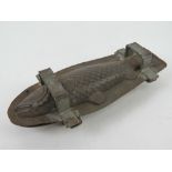 An Edwardian two part mousse mould in the form of a fish (chubb like) 8 1/2" long (20.6 cm).