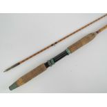 A vintage Allcocks two piece split cane spinning fishing rod 'Lightcaster', 8ft long.