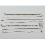 A silver Charles Rennie Mackintosh inspired bracelet and earring set,