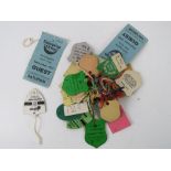 A quantity of assorted vintage horse racing entrance and club badges,