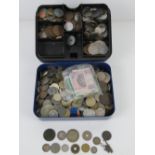 A quantity of assorted world coinage and bank notes,