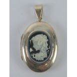 A large silver locket having black and white cameo portrait of a female with flower, stampe d925, 4,