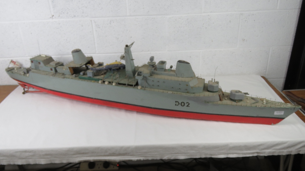 A scratch built scale model part finished vintage naval battleship of unknown class of wooden