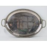 A silver plated serving tray having Celtic pattern border and twin carry handles, 48.5 x 31.