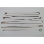 Four substantial silver chain necklaces, 17.