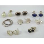 A quantity of assorted pairs of silver earrings including onyx, lapis lazuli, smoky quartz, etc.