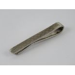 A HM silver tie slide / tie clip, 4.7cm in length, hallmarked for Birmingham.