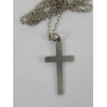 A silver crucifix pendant of plain design, stamped silver, upon white meal chain, 3.