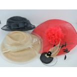 Three ladies hats in navy, cream and red