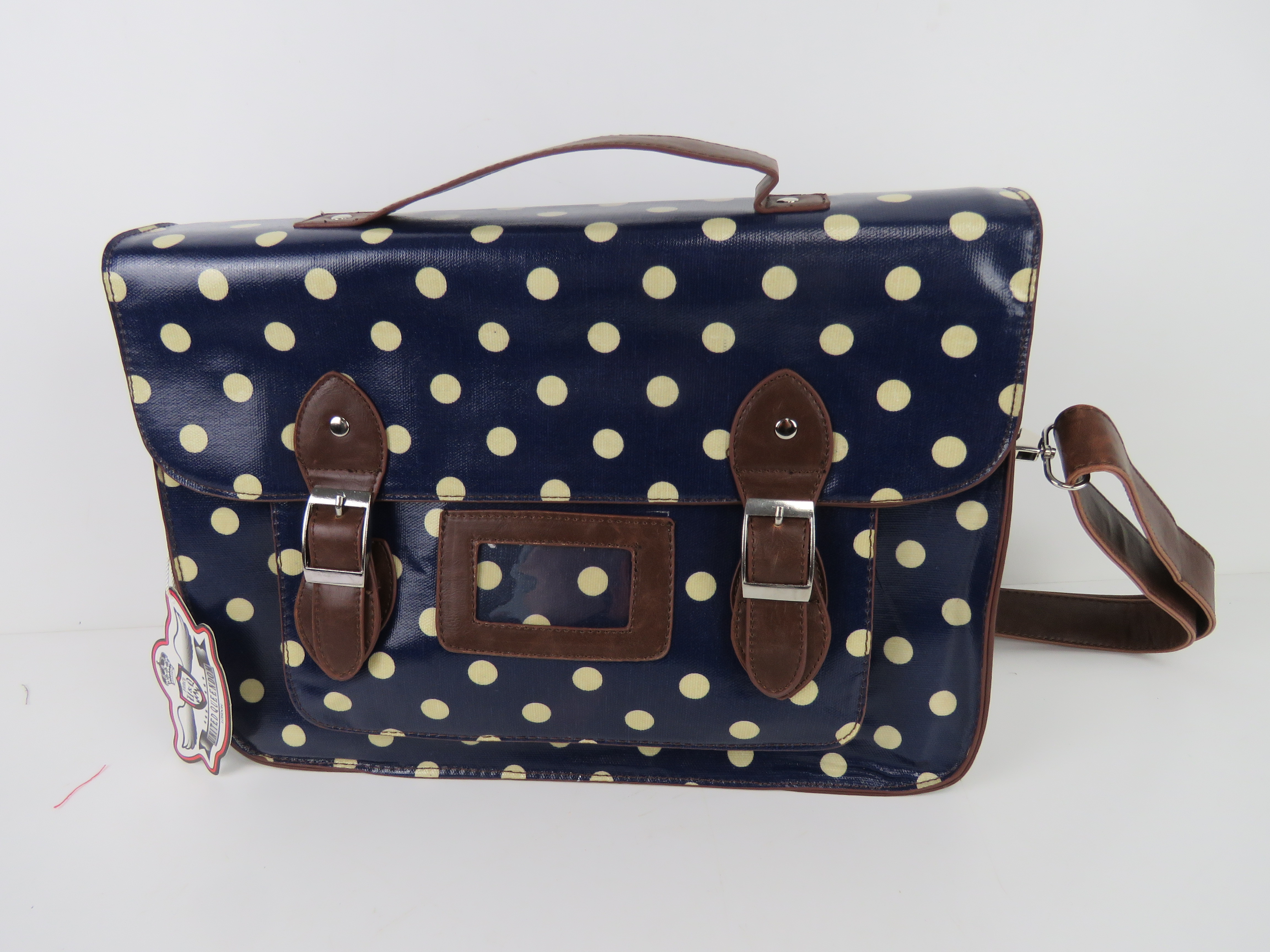 A blue polka dot satchel type handbag 'a