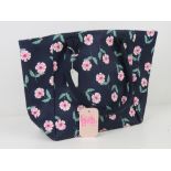 An 'as new' navy floral tote bag by Nico