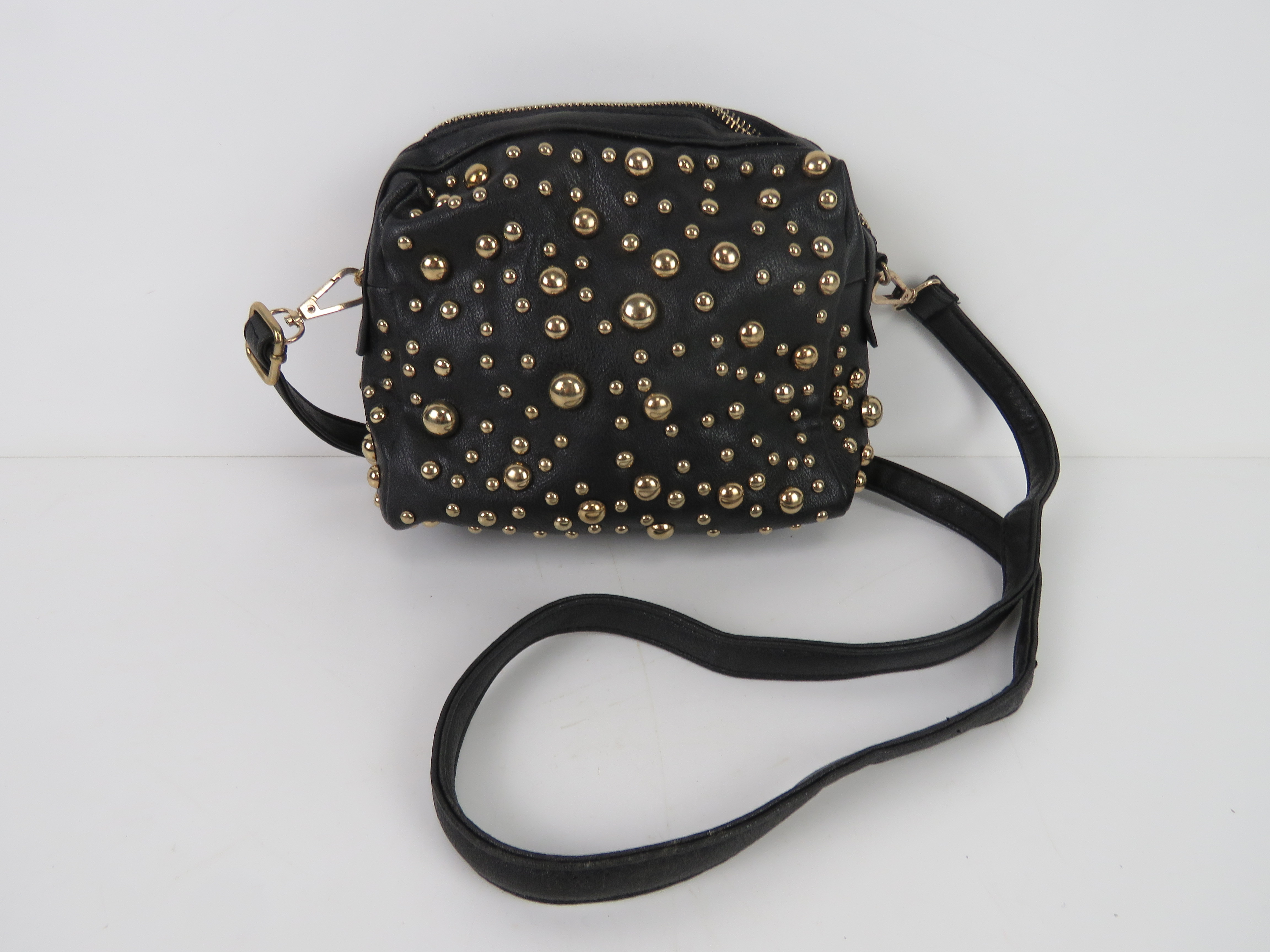 A black handbag with stud decoration 'as