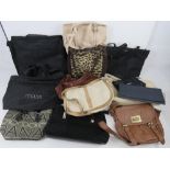 A quantity of assorted handbags.