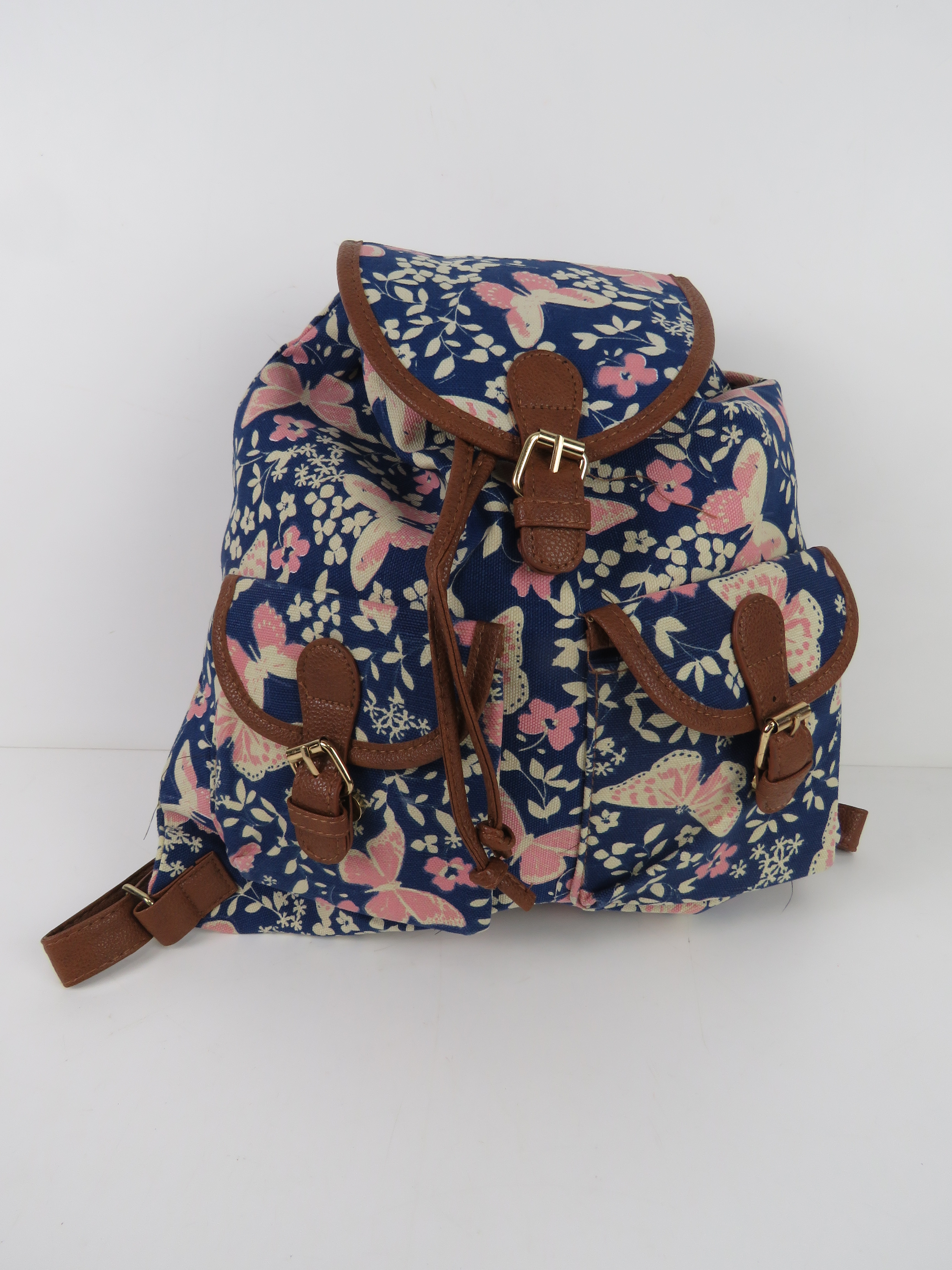 A navy and pink butterfly themed rucksac