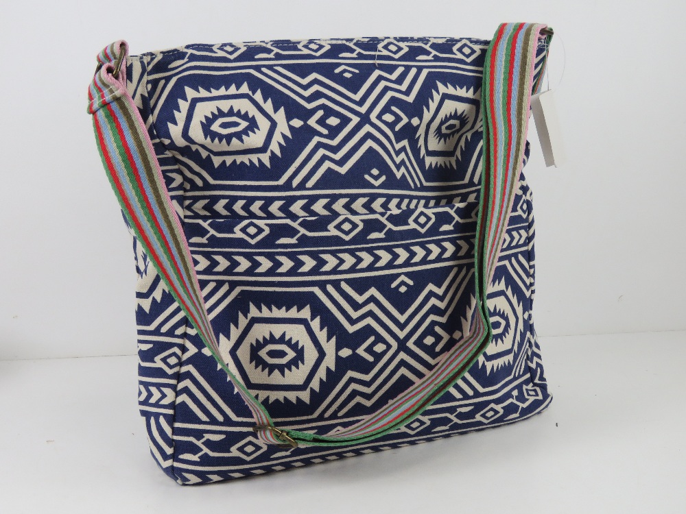 A fabric navy blue Aztec pattern tote ba