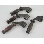 Four Bren gun handles.