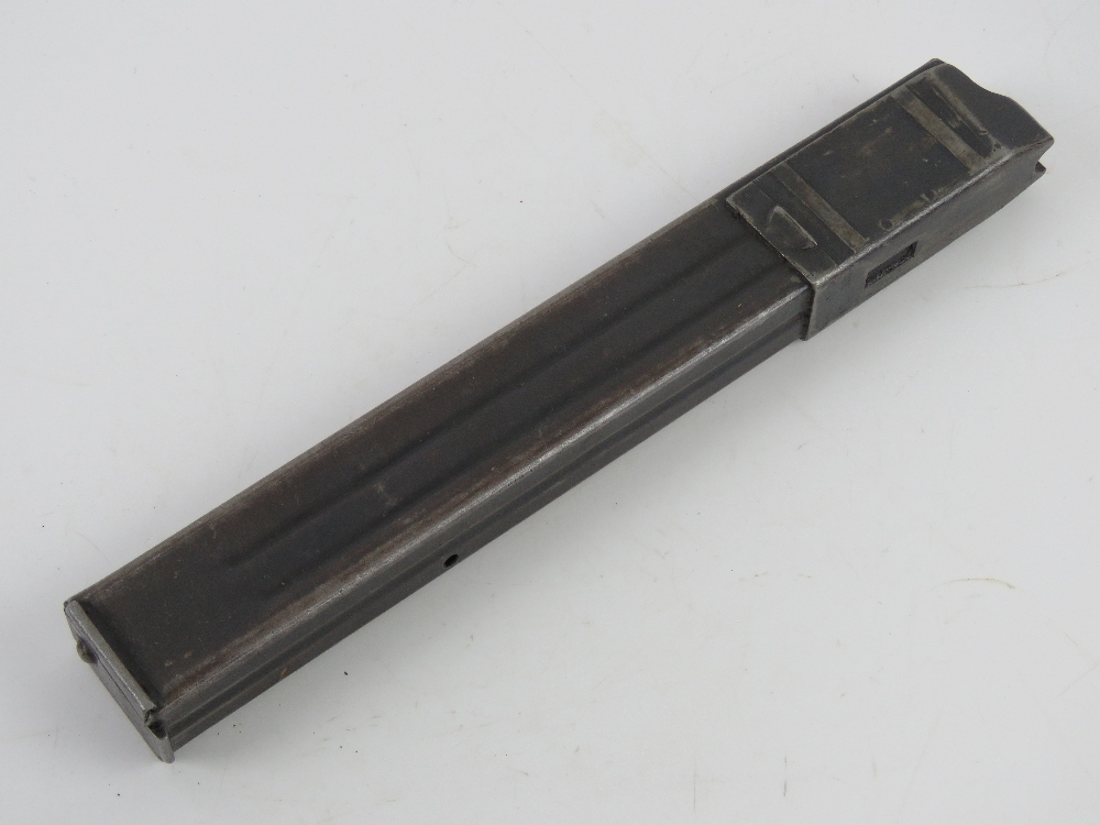 A WWII German MP38-MP40 SMG stick magazine bearing maker marks and German military marks upon.