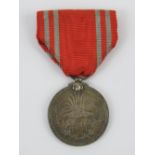 A WWII Japanese Red Cross Medal in box.