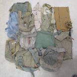 A quantity of assorted WWII gas mask bags.