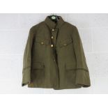 WWII Japanese Army Jacket having label and buttons, bearing Japanese writing within.