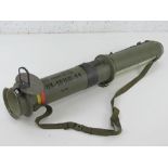 A deactivated Polish RPG-75 68mm rocket launcher having opening mechanism, flip up sights and sling.