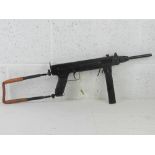 A deactivated Madsen M50 sub machine gun having moving dummy metal bolt (under spring pressure),