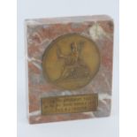 A marble base award dedicated to Capt. B D Chapman in the 1st BN The Royal Norfolk Regt in 1947.