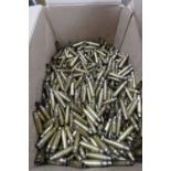 A large quantity of 7.62 inert brass cases.