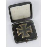 A WWII German first class Iron Cross in presentation box, pin stamped '20'.