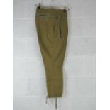 A pair of WWII Japanese Army trousers, dated 1942 bearing Japanese writing within.