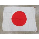 A WWII Japanese Red Rising Sun flag measuring 90 x 70cm.