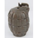 An inert WWII British Mills grenade.