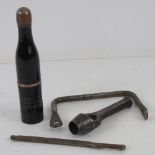 A kit bag handle together with a 15mm wad cutter and an officers cigarette holder dated 1908.