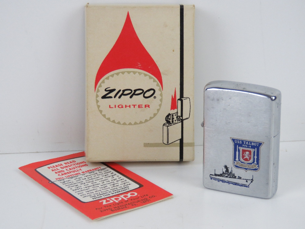 A USS Talbot FFG-4 'Determined' Zippo lighter 'as new' in box.