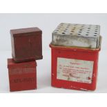 An empty British Mills detonator box with two empty fuse pots.