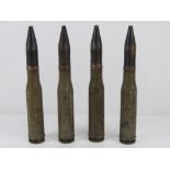 A quantity of inert Russian 23mm training rounds. Four items.